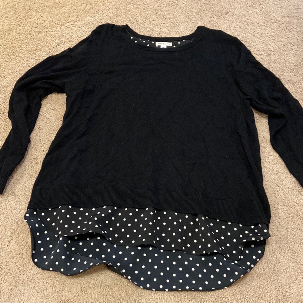 Black light sweater with blouse light texture trim at bottom with polka dots